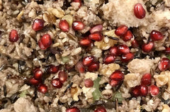 WINTER SQUASH WITH wild RICE-sourdough-POMEGRANATE STUFFING